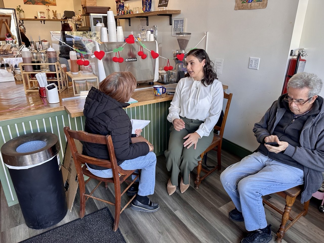 Elizabeth Quintero meeting with clients