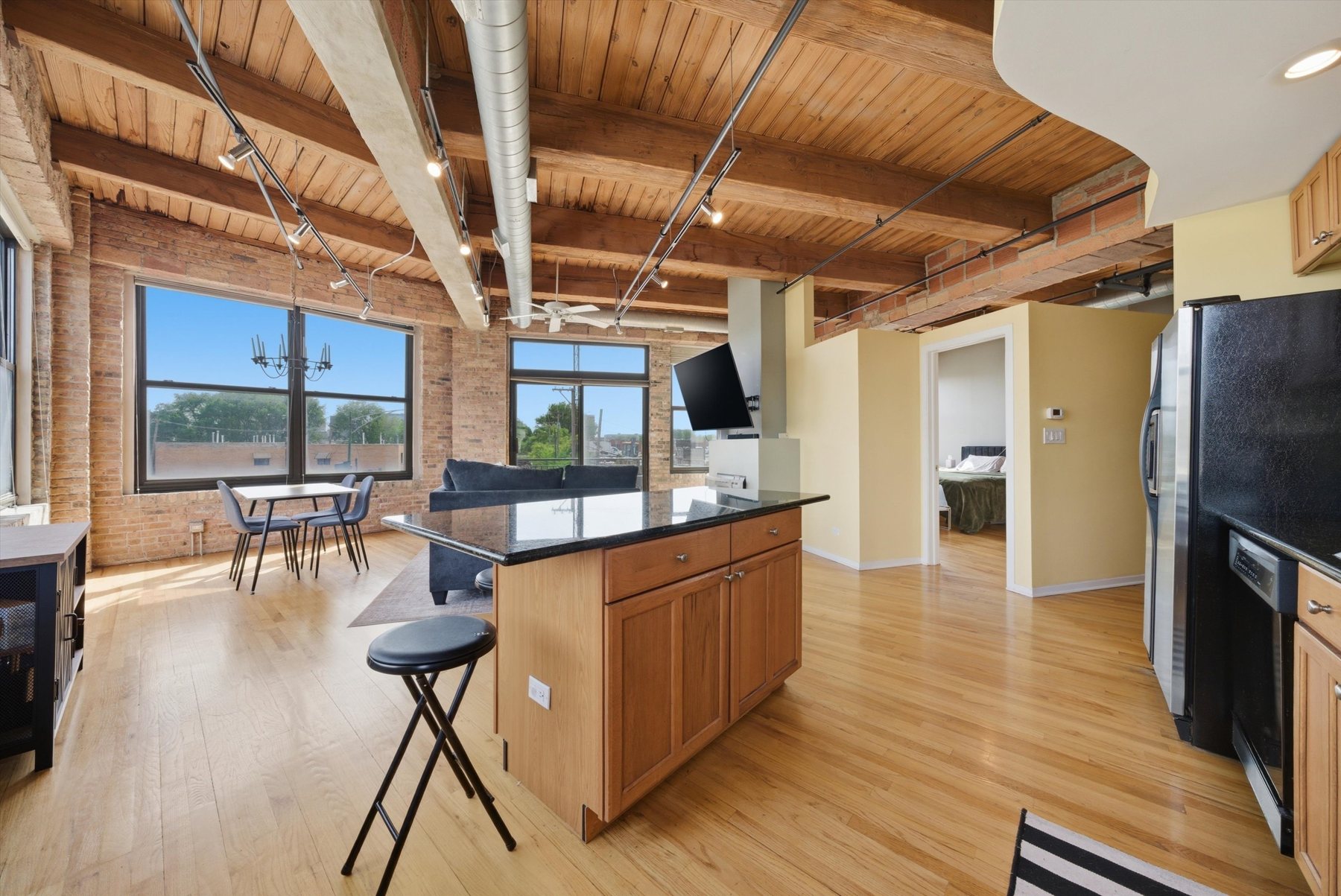 Open kitchen and living area at 2310 S Canal St Unit 201