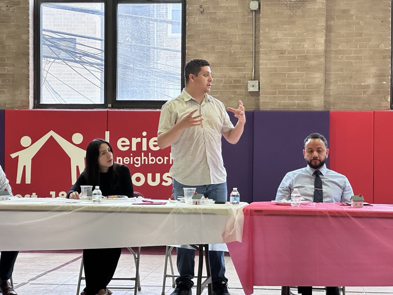 Esteban Rodriguez speaking at Erie Neighborhood House